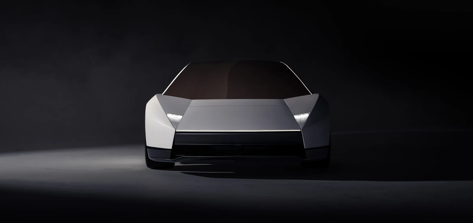 Tesla's front view of the redesigned white Roadster, showing its angular nose, narrow headlights and bronze-tinted canopy.